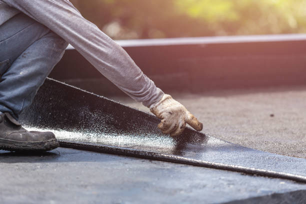 Professional Basement Waterproofing technician working in Delano, MN